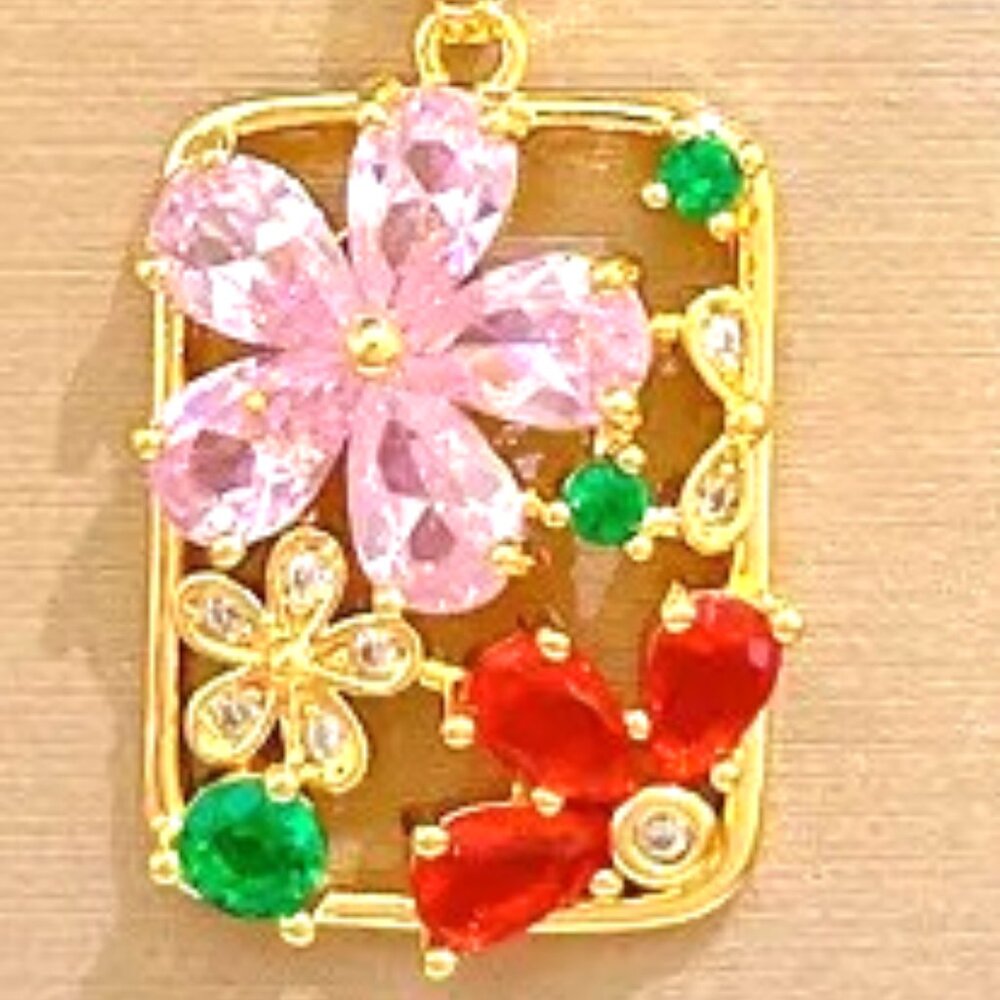 MULTICOLOR CRYSTAL FLOWERS A SMALLSQUARE PENDANT IS A GARDEN GORGEOUS NECKLACE